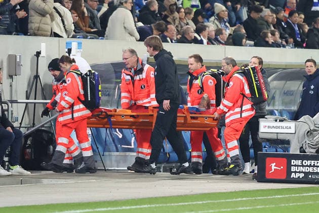 21.03.2026, xrekx, Fussball 2.Bundesliga, SV Darmstadt 98 - FC Schalke 04 v.l. Luca Marseiler (SV Darmstadt 98) verletzt, Verletzung, Schmerz, Schmerzen, injured, injury, pain, pains Auswechslung ,Trage (DFL DFB REGULATIONS PROHIBIT ANY USE OF PHOTOGRAPHS as IMAGE SEQUENCES and or QUASI-VIDEO) Darmstadt