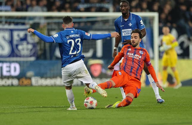 21.03.2026, Fussball 2. Bundesliga, SV Darmstadt 98 - FC Schalke 04, v.l., Marco Richter (SV Darmstadt 98), Kenan Karaman (FC Schalke 04) DFL DFB REGULATIONS PROHIBIT ANY USE OF PHOTOGRAPHS AS IMAGE SEQUENCES AND OR QUASI-VIDEO. xdcx