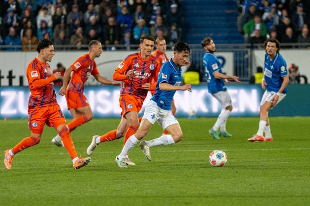 2. Bundesliga: SV Darmstadt 98 vs FC Schalke 04, Merck-Stadion am Böllenfalltor, 21.03.2026 Am Ball Hiroki Akiyama (SV Darmstadt 98, 16) 2. Bundesliga: SV Darmstadt 98 vs FC Schalke 04, Merck-Stadion am Böllenfalltor, 21.03.2026 DFB DFL REGULATIONS PROHIBIT ANY USE OF PHOTOGRAPHS AS IMAGE SEQUENCES AND OR QUASI-VIDEO.