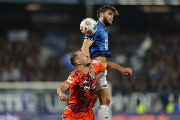 21.03.2026, Fussball 2. Bundesliga, SV Darmstadt 98 - FC Schalke 04, v.l., Nikola Katic (FC Schalke 04), Killian Corredor (SV Darmstadt 98) DFL DFB REGULATIONS PROHIBIT ANY USE OF PHOTOGRAPHS AS IMAGE SEQUENCES AND OR QUASI-VIDEO. xdcx