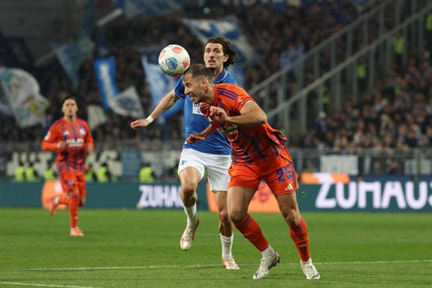 2025.03.21 xjfx Fussball 2.Bundesliga SV Darmstadt 98 - FC Schalke 04 v.l., Nikola Katic (FC Schalke 04), Fraser Hornby (SV Darmstadt 98) in aktion, in action, (DFL DFB REGULATIONS PROHIBIT ANY USE OF PHOTOGRAPHS as IMAGE SEQUENCES and or QUASI-VIDEO)