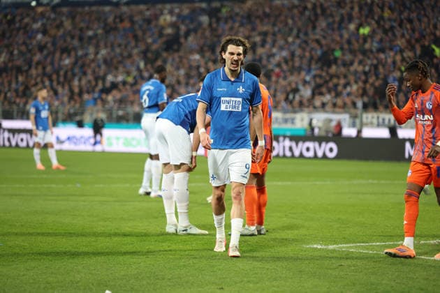21.03.2026, xrekx, Fussball 2.Bundesliga, SV Darmstadt 98 - FC Schalke 04 v.l. Fraser Hornby (SV Darmstadt 98) enttaeuscht, enttäuscht, schaut enttaeuscht, niedergeschlagen, disappointed (DFL DFB REGULATIONS PROHIBIT ANY USE OF PHOTOGRAPHS as IMAGE SEQUENCES and or QUASI-VIDEO) Darmstadt