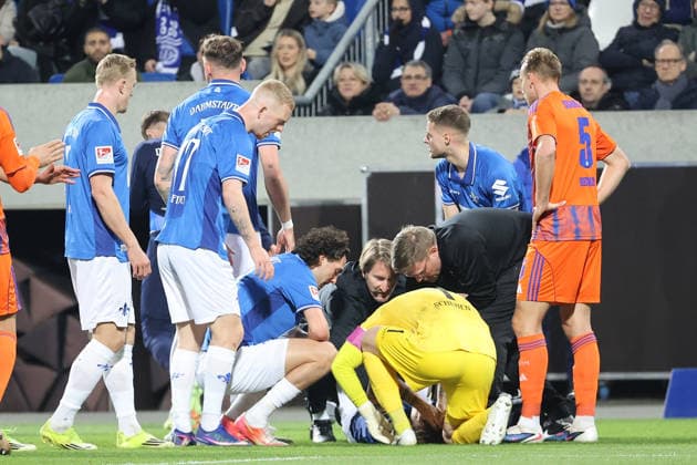 21.03.2026, xtvx, Fussball 2.Bundesliga, SV Darmstadt 98 - FC Schalke 04 v.l. Luca Marseiler (SV Darmstadt 98) Verletzung (DFL DFB REGULATIONS PROHIBIT ANY USE OF PHOTOGRAPHS as IMAGE SEQUENCES and or QUASI-VIDEO) Darmstadt