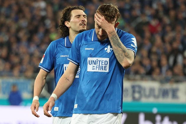 21.03.2026, xrekx, Fussball 2.Bundesliga, SV Darmstadt 98 - FC Schalke 04 v.l. Fraser Hornby (SV Darmstadt 98) Matej Maglica (SV Darmstadt 98) enttaeuscht, enttäuscht, schaut enttaeuscht, niedergeschlagen, disappointed (DFL DFB REGULATIONS PROHIBIT ANY USE OF PHOTOGRAPHS as IMAGE SEQUENCES and or QUASI-VIDEO) Darmstadt