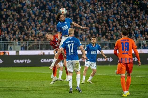 2. Bundesliga: SV Darmstadt 98 vs FC Schalke 04, Merck-Stadion am Böllenfalltor, 21.03.2026 Kopfball von Fraser Hornby (SV Darmstadt 98, 9) 2. Bundesliga: SV Darmstadt 98 vs FC Schalke 04, Merck-Stadion am Böllenfalltor, 21.03.2026 DFB DFL REGULATIONS PROHIBIT ANY USE OF PHOTOGRAPHS AS IMAGE SEQUENCES AND OR QUASI-VIDEO.