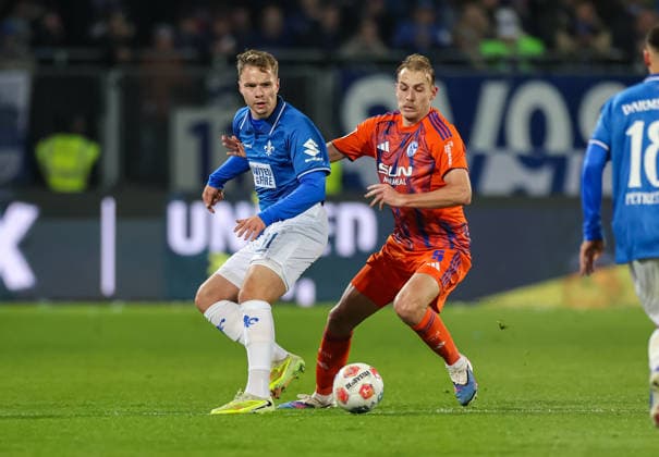 21.03.2026, Fussball 2. Bundesliga, SV Darmstadt 98 - FC Schalke 04, v.l., Niklas Schmidt (SV Darmstadt 98), Timo Becker (FC Schalke 04) DFL DFB REGULATIONS PROHIBIT ANY USE OF PHOTOGRAPHS AS IMAGE SEQUENCES AND OR QUASI-VIDEO. xdcx