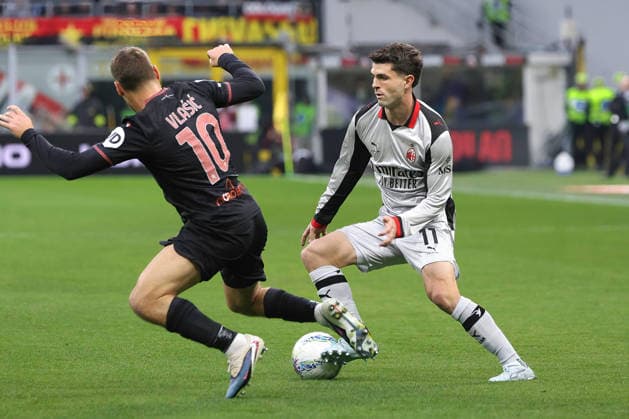 AC Milan vs Torino FC Italy, Milan, 2026 03 21: Nikola Vlasic, Christian Pulisic (AC Milan) drives to the penalty area in the first half during soccer game AC Milan vs Torino FC, Serie A Enilive 2025-2026 day 30 at San Siro Stadium Milan Lombardy Italy Copyright: xFabrizioxAndreaxBertanix