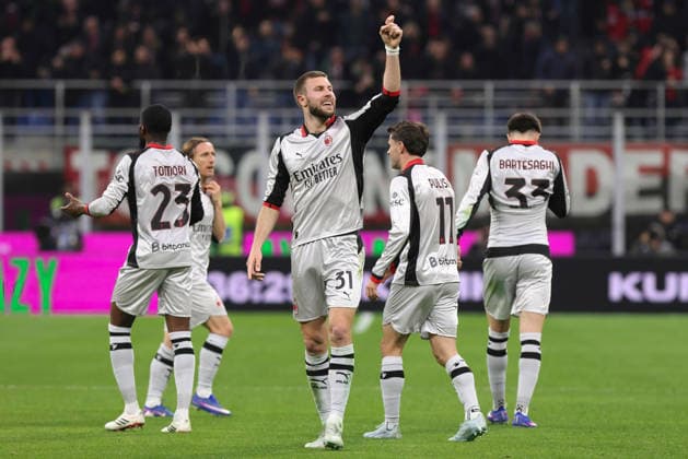 AC Milan vs Torino FC Italy, Milan, 2026 03 21: Koni De Winter, Christian Pulisic, Davide Bartesaghi, Strahinja Pavlovic (AC Milan) scores and celebrates the 1-0 goal at 36 during soccer game AC Milan vs Torino FC, Serie A Enilive 2025-2026 day 30 at San Siro Stadium Milan Lombardy Italy Copyright: xFabrizioxAndreaxBertanix