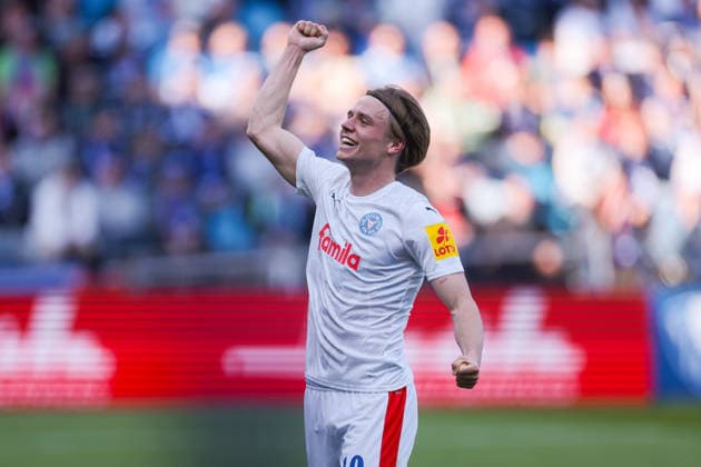 22.03.2026, Fussball, 2. Bundesliga, 27. Spieltag, VfL Bochum 1848 - Holstein Kiel. Jonas Therkelsen (Holstein Kiel) bejubelt das Tor zum 2:3. Bochum Vonovia Ruhrstadion NRW Deutschland xRHR-FOTO DEx