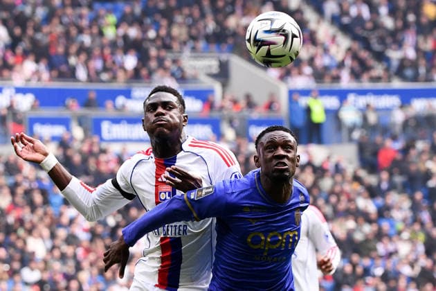Olympique Lyonnais v AS Monaco - Ligue 1 McDonald s 2025 2026 19 Moussa NIAKHATE (ol) - 09 Folarin BALOGUN (asm) during the Ligue 1 McDonald s match between Lyon and Monaco at Groupama Stadium on March 22, 2026 in Lyon, France. Lyon France  Copyright: xFEPx 776348333