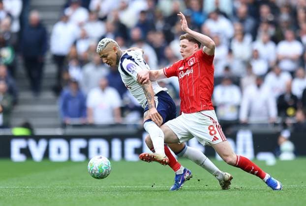 Richarlison of Tottenham Hotspur is fouled by Elliot Anderson of Nottingham Forest Tottenham Hotspur v Nottingham Forest, Premier League, Football, Tottenham Hotspur Stadium, London, UK - 22 Mar 2026London Tottenham Hotspur Stadium United Kingdom EDITORIAL USE ONLY No use with unauthorised audio, video, data, fixture lists, club league logos or live services. Online in-match use limited to 120 images, no video emulation. No use in betting, games or single club league player publications. Copyright: xMichaelxZemanek Shutterstockx 16783329ai