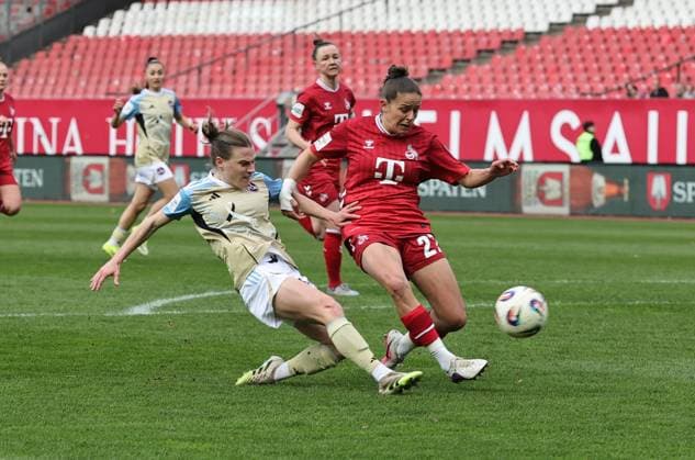 22.03.2026 - Fussball - Saison 2025 2026 - 1. Frauen - Fussball - Bundesliga - 21. Spieltag: 1. FC Nürnberg FCN ( Club ) - 1. FC Köln - Sportfoto Zink DaMa - xdaxmax - Nastassja Lein (24, 1. FC Nürnberg FCN ) mit Torschuss gg Laura Feiersinger (27, 1. FC Köln )