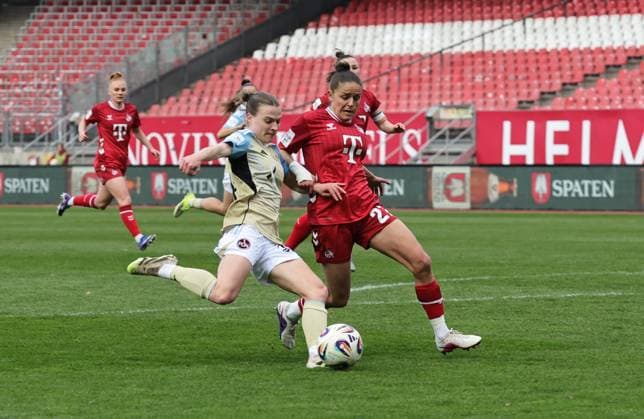 22.03.2026 - Fussball - Saison 2025 2026 - 1. Frauen - Fussball - Bundesliga - 21. Spieltag: 1. FC Nürnberg FCN ( Club ) - 1. FC Köln - Sportfoto Zink DaMa - xdaxmax - Nastassja Lein (24, 1. FC Nürnberg FCN ) mit Torschuss gg Laura Feiersinger (27, 1. FC Köln )
