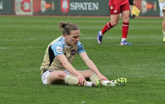 22.03.2026 - Fussball - Saison 2025 2026 - 1. Frauen - Fussball - Bundesliga - 21. Spieltag: 1. FC Nürnberg FCN ( Club ) - 1. FC Köln - Sportfoto Zink DaMa - xdaxmax - Nastassja Lein (24, 1. FC Nürnberg FCN ) enttäuscht Enttäuschung am Boden