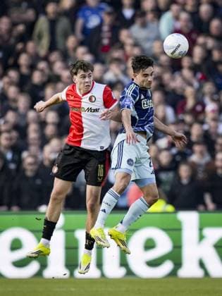 ROTTERDAM - (lr) Leo Sauer of Feyenoord and Lucas Rosa of AFC Ajax during the Dutch Eredivisie match between Feyenoord and AFC Ajax at Feyenoord Stadium De Kuip on March 22, 2026 in Rotterdam, the Netherlands. TOBIAS KLEUVER ANP Eredivisie 2025-2026 xVIxANPxSportx xxANPxIVx 554086030 originalFilename: 554086030.jpg