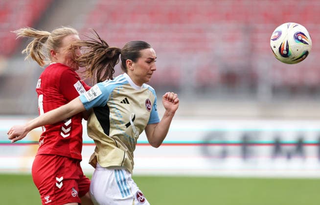 Bremer Pauline - Lara Meroni , 1.FC Nürnberg-1.FC Köln Frauen , Frauen Bundesliga , Fußball , in den Max Morlock Stadion, in Nürnberg , Bayern , Deutschland. März 22 , 2026 . Photo by: Davide Elias IPA Photo Pressefoto DENL Copyright: xDavidexEliasx
