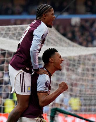 Birmingham, England, 22nd March 2026. Ollie Watkins of Aston Villa celebrates after scoring the second goal with Leon Bailey of Aston Villa during the Aston Villa vs West Ham United Premier League match at Villa Park, Birmingham. Picture credit should read: Andrew Yates Sportimage EDITORIAL USE ONLY. No use with unauthorised audio, video, data, fixture lists, club league logos or live services. Online in-match use limited to 120 images, no video emulation. No use in betting, games or single club league player publications. SPI_029_AY_VILLA_WEST_HAM SPI-4635-0029