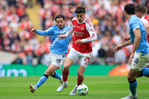 Arsenal v Manchester City, EFL Cup, Cup Final Kai Havertz (29) of Arsenal and Bernardo Silva (20) of Manchester City challenge for the ball during the EFL Cup match between Arsenal and Manchester City at Wembley Stadium, London, UK on 22 March 2026. London Wembley Stadium Greater London UK Editorial use only DataCo restrictions apply See www.football-dataco.com , Copyright: xConorxMolloyx PSI-23936-0032