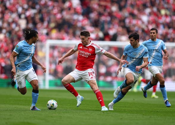 22nd March 2026; Wembley Stadium, London, England; Carabao Cup Final Football, Arsenal versus Manchester City; Viktor Gyokeres of Arsenal under pressure from Abdukodir Khusanov and Nathan Ake of Manchester City  JPxFletcher Content restricted for UK based newspaper