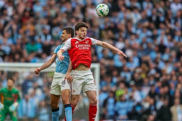 Carabao Cup Final Arsenal v Manchester City Declan Rice of Arsenal battle for the ball in the air with Rodrigo of Manchester City during the Carabao Cup Final match Arsenal vs Manchester City at Emirates, London, United Kingdom on 22 March 2026 (Photo by Alfie Cosgrove News Images) London Emirates Greater London United Kingdom Copyright: xAlfiexCosgrove NewsxImagesx