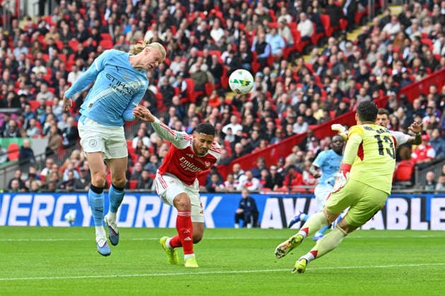 Arsenal v Manchester City, EFL Cup, Cup Final Erling Haaland (9) of Manchester City is unable to get on the end od a cross by Antoine Semenyo (42) of Manchester City during the EFL Cup match between Arsenal and Manchester City at Wembley Stadium, London, UK on 22 March 2026. London Wembley Stadium Greater London UK Editorial use only DataCo restrictions apply See www.football-dataco.com , Copyright: xGrahamxHuntx PSI-23937-0048