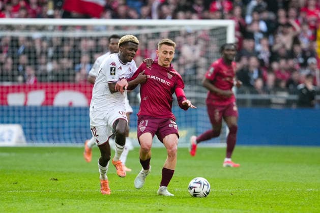 Stade Rennais FC v FC Metz - Ligue 1 McDonald s 2025 2026 12 Alpha Amadou TOURE (fcm) - 21 Valentin RONGIER (srfc) during the Ligue 1 McDonald s match between Rennes and Metz at Roazhon Park on March 22, 2026 in Rennes, France. Rennes France  Copyright: xFEPx 776348336
