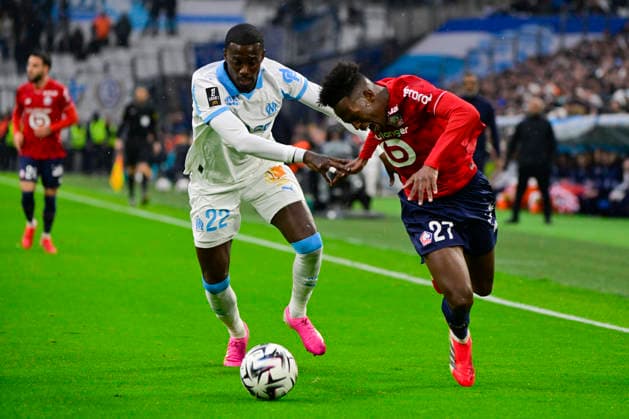 FOOTBALL : Olympique de Marseille VS LOSC - Ligue 1 McDonald s - 22 03 2026 Timothy Weah (OM) FÃ lix Correia (LOSC) - Ligue 1 McDonald™s match between Olympique de Marseille and LOSC on March 22, 2026 at the Orange Velodrome Stadium in Marseille. MarseilleFrance  Copyright: xWilliamxCannarellax