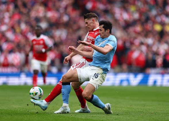 22nd March 2026; Wembley Stadium, London, England; Carabao Cup Final Football, Arsenal versus Manchester City; Abdukodir Khusanov of Manchester City tackles Viktor Gyokeres of Arsenal  JPxFletcher Content restricted for UK based newspaper