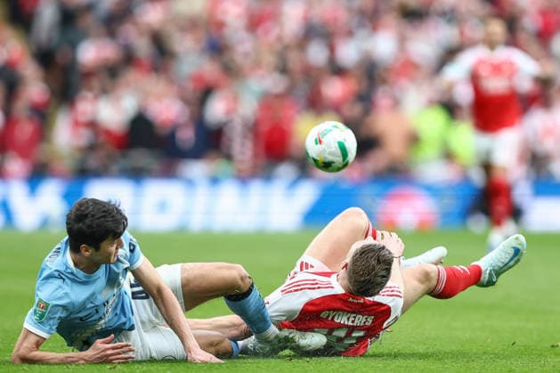 Arsenal v Manchester City, Carabao Cup Final Abdukodir Khusanov of Manchester City tackles Viktor Gyokeres of Arsenal during the Arsenal v Manchester City Carabao Cup Final match at Wembley Stadium, London, England on 22 March 2026 Credit: Ian Stephen Every Second Media Editorial use only. All images are copyright Every Second Media Limited. No images may be reproduced without prior permission. All rights reserved. Premier League and Football League images are subject to licensing agreements with Football DataCo Limited. see https: www.football-dataco.com Copyright: xIMAGO EveryxSecondxMediax ESM-1873-0035 IanxStephenx xEveryxSecondxMediax