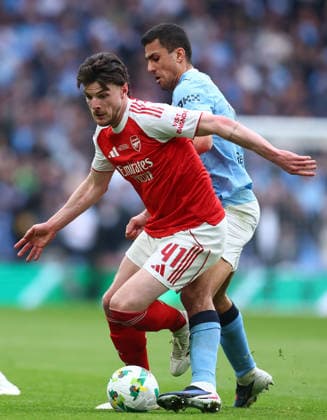 London, England, 22nd March 2026. Declan Rice of Arsenal and Rodri of Manchester City challenge for the ball during the Arsenal vs Manchester City Carabao Cup Final match at Wembley Stadium, London. Picture credit should read: Paul Terry Sportimage EDITORIAL USE ONLY. No use with unauthorised audio, video, data, fixture lists, club league logos or live services. Online in-match use limited to 120 images, no video emulation. No use in betting, games or single club league player publications. SPI_049_PT_Arsenal_Man_City SPI-4632-0049