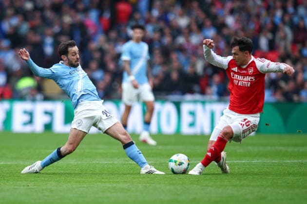 English Football League Cup Final: Arsenal v Manchester City LONDON, UK - 22nd March 2026: Bernardo Silva of Manchester City vies for possession with Martin Zubimendi of Arsenal during the Carabao Cup Final match between Arsenal FC and Manchester City FC at Wembley Stadium London Wembley Stadium England United Kingdom Copyright: xCraigxMercerx xPeakxActionxPhotosx