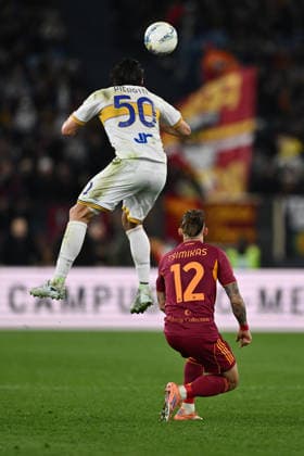 Santiago Pierotti of U.S. Lecce and Kostas Tsimikas of A.S. Roma are in action during the 30th day of the Serie A Championship between A.S. Roma and U.S. Lecce at the Olympic Stadium on March 22, 2026 in Rome, Italy.  Copyright: xDomenicoxCippitelli IPAxSportx xipa-agency.netx xx IPA_73301145 IPA_Agency_IPA73301145
