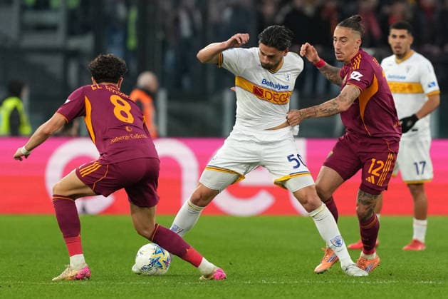 Neil El Aynaoui of AS Roma, Santiago Pierotti of US Lecce and Kostas Tsimikas of AS Roma during the Serie A 2025 2026 football match between AS Roma and US Lecce at Stadio Olimpico in Rome (Italy), March 22, 2026. AntoniettaxBaldassarre