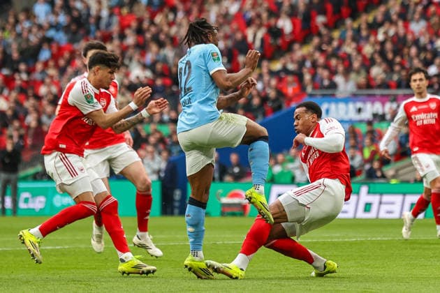 Arsenal v Manchester City - Carabao Cup Final Antonie Semenyo of Manchester City is tackled by Gabriel of Arsenal during the Carabao Cup Final match between Arsenal and Manchester City at Emirates Stadium in London, United Kingdom, on March 22, 2026. London United Kingdom  Copyright: xNewsxImagesx originalFilename:cosgrove-carabaoc260322_npvmH.jpg
