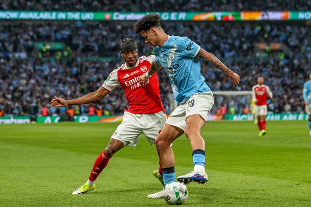Arsenal v Manchester City - Carabao Cup Final Nico O Reilly of Manchester City competes for the ball with Noni Madueke of Arsenal during the Carabao Cup Final match between Arsenal and Manchester City at Emirates Stadium in London, United Kingdom, on March 22, 2026. London Greater London United Kingdom  Copyright: xNewsxImagesx originalFilename:cosgrove-carabaoc260322_npYN4.jpg