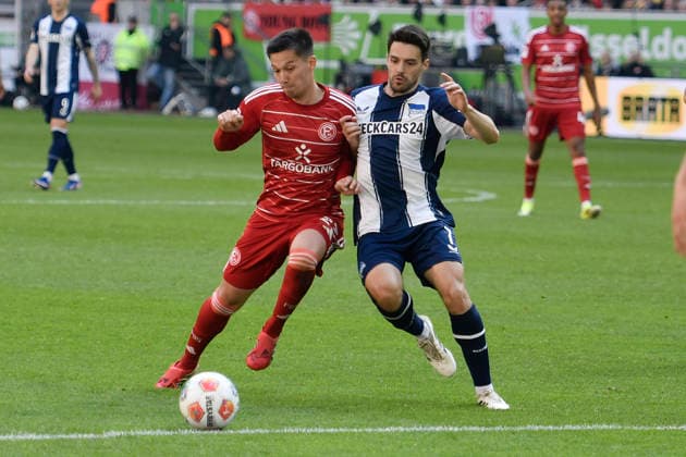 v. li. im Zweikampf Shinta Appelkamp (Duesseldorf 23) Josip Brekalo (BSC 7) 22.03.2026 ¢ Fussball ¢ Fortuna Duesseldorf vs Hertha BSC, Merkur Spiel-Arena, Duesseldorf, DFB DFL REGULATIONS PROHIBIT ANY USE OF PHOTOGRAPHS AS IMAGE SEQUENCES AND OR QUASI-VIDE