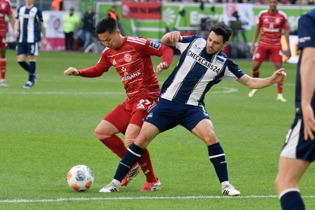 v. li. im Zweikampf Shinta Appelkamp (Duesseldorf 23) Josip Brekalo (BSC 7) 22.03.2026 ¢ Fussball ¢ Fortuna Duesseldorf vs Hertha BSC, Merkur Spiel-Arena, Duesseldorf, DFB DFL REGULATIONS PROHIBIT ANY USE OF PHOTOGRAPHS AS IMAGE SEQUENCES AND OR QUASI-VIDE