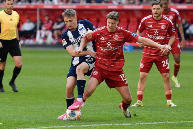 v. li. im Zweikampf Marten Winkler (BSC 22) Cedric Itten (Duesseldorf 13) 22.03.2026 ¢ Fussball ¢ Fortuna Duesseldorf vs Hertha BSC, Merkur Spiel-Arena, Duesseldorf, DFB DFL REGULATIONS PROHIBIT ANY USE OF PHOTOGRAPHS AS IMAGE SEQUENCES AND OR QUASI-VIDE
