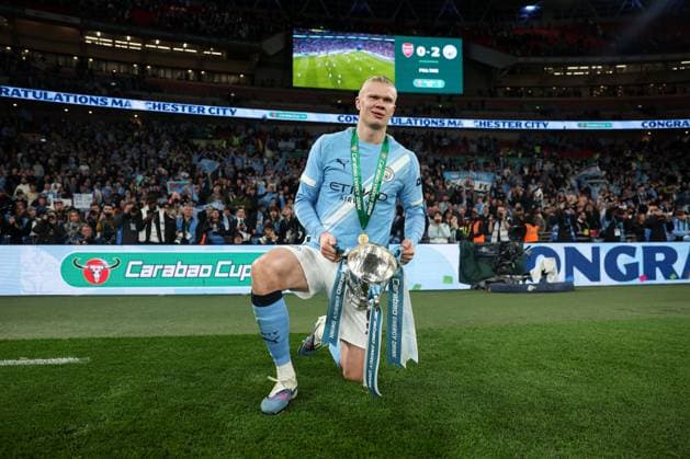 Erling Haaland of Manchester City poses with the 2026 Carabao Cup trophy in front of the fans Arsenal v Manchester City, EFL Carabao Cup, Final, Football, Wembley Stadium, London, UK - 22 Mar 2026London Wembley Stadium United Kingdom EDITORIAL USE ONLY No use with unauthorised audio, video, data, fixture lists, club league logos or live services. Online in-match use limited to 120 images, no video emulation. No use in betting, games or single club league player publications. Copyright: xKieranxMcManus Shutterstockx 16783332mw
