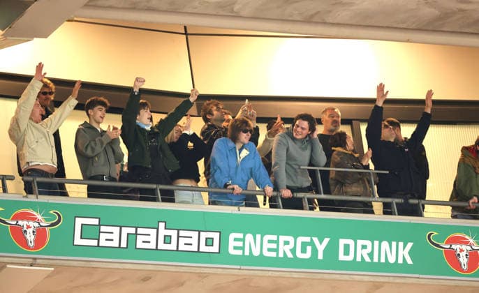 Oasis stars and brothers, Noel (far left), and Liam Gallagher (far right) at the Carabao Cup Final Arsenal v Manchester City match, at Wembley Stadium, London, UK on 22nd March 2026. 