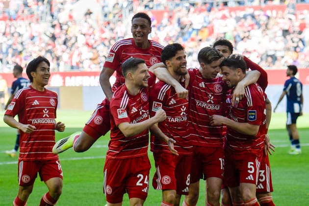 Die Mannschaft von Duesseldorf Jubel Freude Emotion Torjubel Torschuetze Torschütze Linus Gechter, Eigentor 22.03.2026 ¢ Fussball ¢ Fortuna Duesseldorf vs Hertha BSC, Merkur Spiel-Arena, Duesseldorf, DFB DFL REGULATIONS PROHIBIT ANY USE OF PHOTOGRAPHS AS IMAGE SEQUENCES AND OR QUASI-VIDE