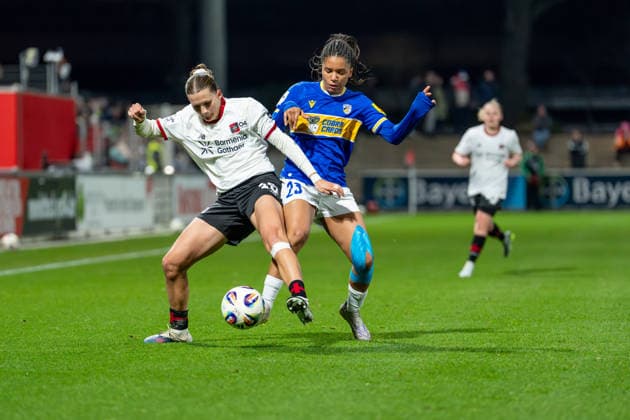 Julia Mickenhagen (Bayer 04 Leverkusen, 18) Zweikampf mit Josephine Bonsu (FC Carl Zeiss Jena, 23) Bayer 04 Leverkusen vs. FC Carl Zeiss Jena, Fussball, Google Pixel Frauen-Bundesliga, 21.Spieltag, Saison 2025 26, 22.03.2026, Bayer 04 Leverkusen vs. FC Carl Zeiss Jena, Fussball, Google Pixel Frauen-Bundesliga, 21.Spieltag, Saison 2025 26, 22.03.2026 Leverkusen Copyright: xEibner-Pressefoto LukasxBaldygax EP_LBA