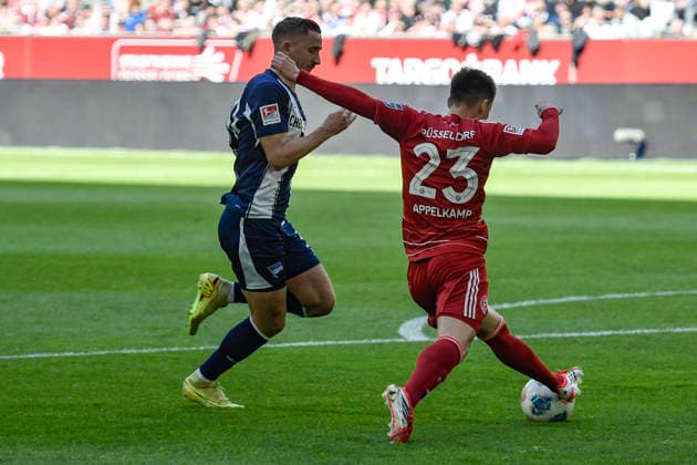 v. li. im Kampf um den Ball Paul Seguin (BSC 30) Shinta Appelkamp (Duesseldorf 23) 22.03.2026 ¢ Fussball ¢ Fortuna Duesseldorf vs Hertha BSC, Merkur Spiel-Arena, Duesseldorf, DFB DFL REGULATIONS PROHIBIT ANY USE OF PHOTOGRAPHS AS IMAGE SEQUENCES AND OR QUASI-VIDE