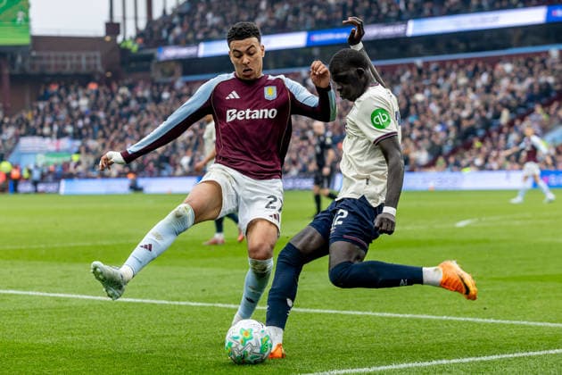 Aston Villa v West Ham United, Premier League West Ham United defender El Hadji Malick Diouf (12) tries to clear ball from Aston Villa midfielder Morgan Rogers (27) during the Premier League match between Aston Villa and West Ham United at Villa Park, Birmingham, UK on 22 March 2026. Birmingham Villa Park West Midlands UK Editorial use only DataCo restrictions apply See www.football-dataco.com , Copyright: xManjitxNarotrax PSI-23950-0158