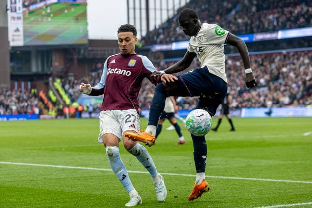 Aston Villa v West Ham United, Premier League West Ham United defender El Hadji Malick Diouf (12) tries to clear ball from Aston Villa midfielder Morgan Rogers (27) but blocked during the Premier League match between Aston Villa and West Ham United at Villa Park, Birmingham, UK on 22 March 2026. Birmingham Villa Park West Midlands UK Editorial use only DataCo restrictions apply See www.football-dataco.com , Copyright: xManjitxNarotrax PSI-23950-0159