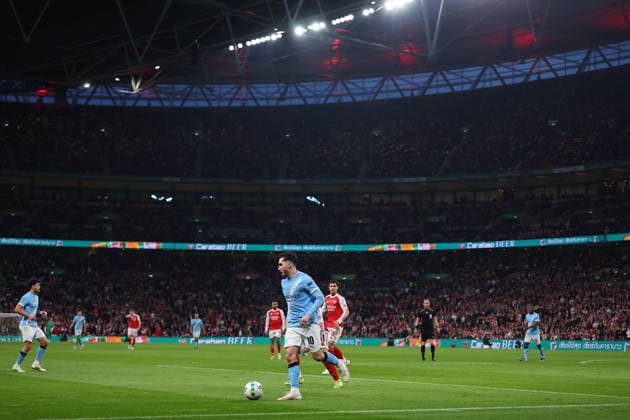 22nd March 2026; Wembley Stadium, London, England; Carabao Cup Final Football, Arsenal versus Manchester City; Rayan Cherki of Manchester City on the ball inside a packed Wembley Stadium  JPxFletcher Content restricted for UK based newspaper