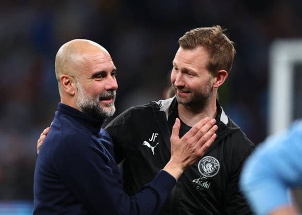 22nd March 2026; Wembley Stadium, London, England; Carabao Cup Final Football, Arsenal versus Manchester City; Manchester City manager Pep Guardiola with set-piece coach James French after the match  JPxFletcher Content restricted for UK based newspaper