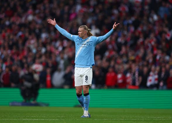 22nd March 2026; Wembley Stadium, London, England; Carabao Cup Final Football, Arsenal versus Manchester City; Erling Haaland of Manchester City complaining to Referee Peter Banks for Arsenal time waisting during the 1st half  JPxFletcher Content restricted for UK based newspaper
