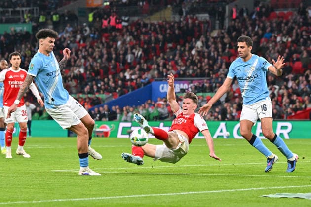 Arsenal v Manchester City, EFL Cup, Cup Final Viktor Gyokeres (14) of Arsenal goes down in the box from the challenge of Rodri (16) of Manchester City during the EFL Cup match between Arsenal and Manchester City at Wembley Stadium, London, UK on 22 March 2026. London Wembley Stadium Greater London UK Editorial use only DataCo restrictions apply See www.football-dataco.com , Copyright: xGrahamxHuntx PSI-23937-0321