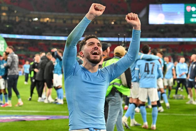 Arsenal v Manchester City, EFL Cup, Cup Final Rayan Cherki (10) of Manchester City celebrates winning the Carabao Cup at full time during the EFL Cup match between Arsenal and Manchester City at Wembley Stadium, London, UK on 22 March 2026. London Wembley Stadium Greater London UK Editorial use only DataCo restrictions apply See www.football-dataco.com , Copyright: xGrahamxHuntx PSI-23937-0324